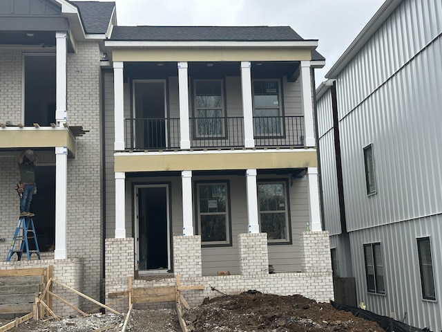 view of front of property featuring covered porch