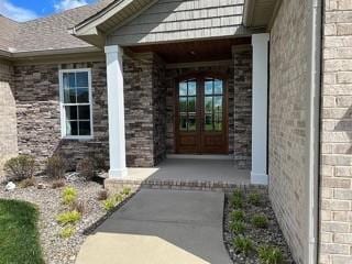 doorway to property featuring french doors