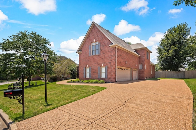 view of side of home with a garage and a lawn