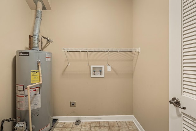 clothes washing area featuring electric dryer hookup, washer hookup, and water heater