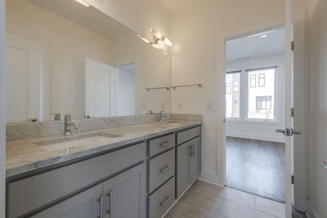 bathroom with vanity and tile patterned flooring