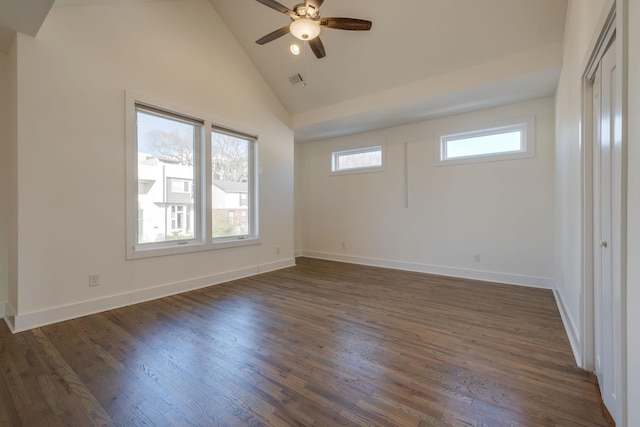 unfurnished room with high vaulted ceiling, dark hardwood / wood-style floors, and ceiling fan