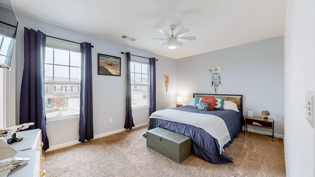 carpeted bedroom with ceiling fan