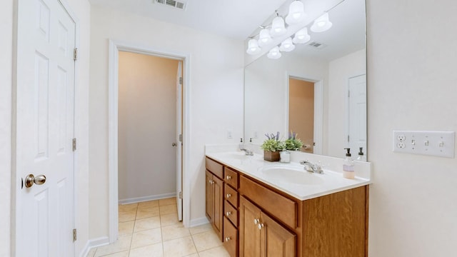 bathroom featuring vanity and tile patterned flooring