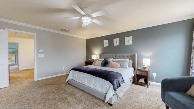 carpeted bedroom with ornamental molding and ceiling fan