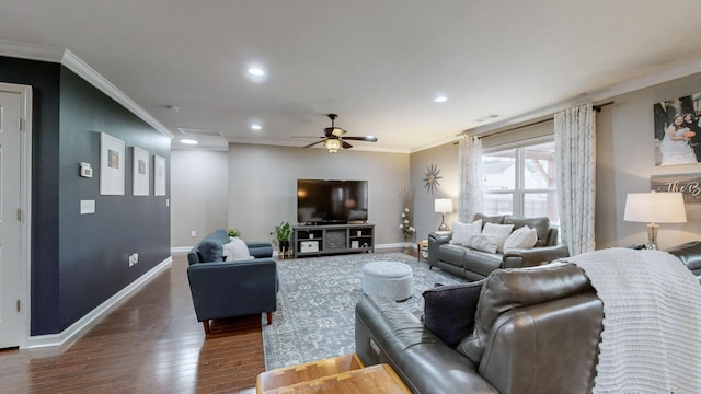 living room featuring crown molding, ceiling fan, and dark wood-type flooring