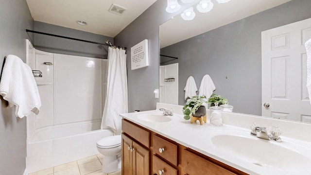 full bathroom featuring tile patterned flooring, shower / tub combo, vanity, and toilet