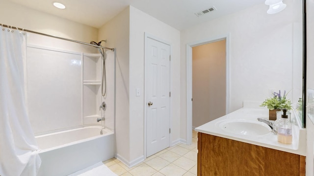 bathroom featuring vanity, tile patterned flooring, and shower / bath combo with shower curtain