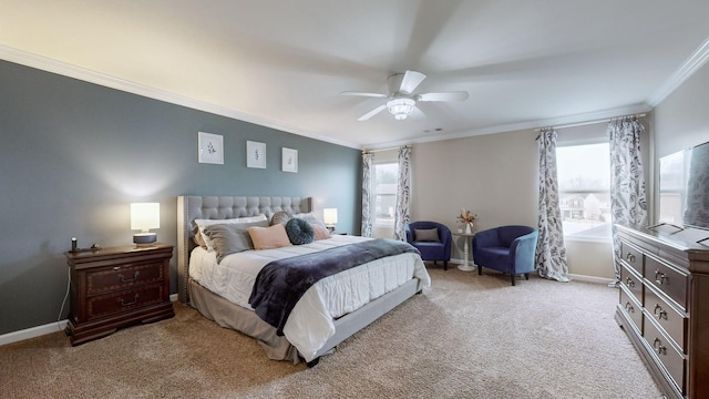 bedroom featuring multiple windows, crown molding, light colored carpet, and ceiling fan