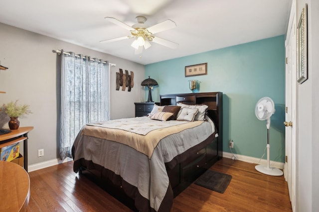 bedroom featuring dark wood-type flooring and ceiling fan