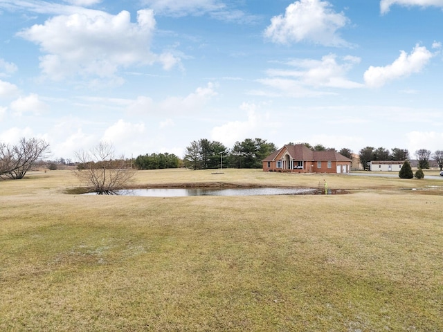 view of yard with a water view