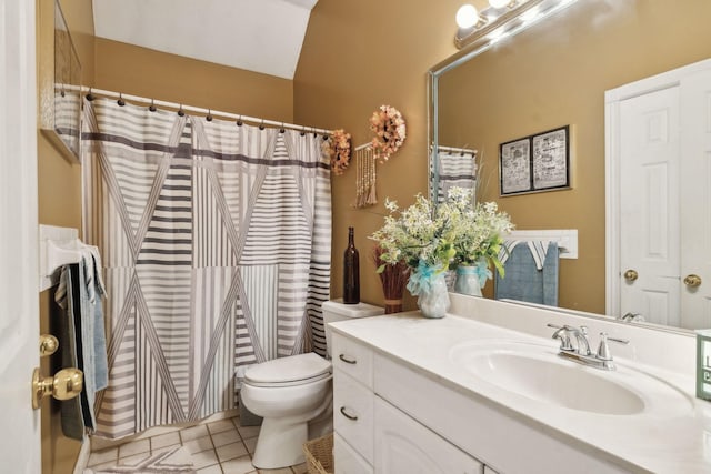 bathroom with walk in shower, vanity, toilet, and tile patterned flooring