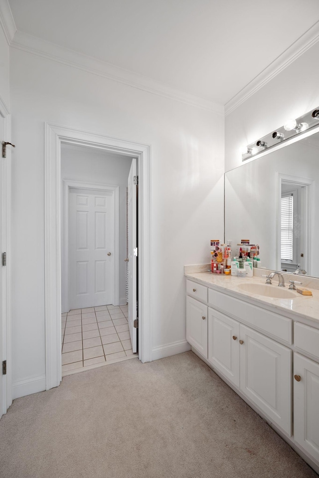 bathroom with vanity and ornamental molding