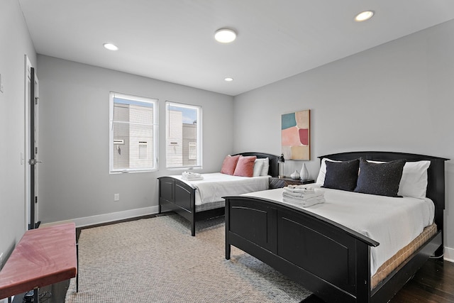 bedroom featuring dark wood-type flooring