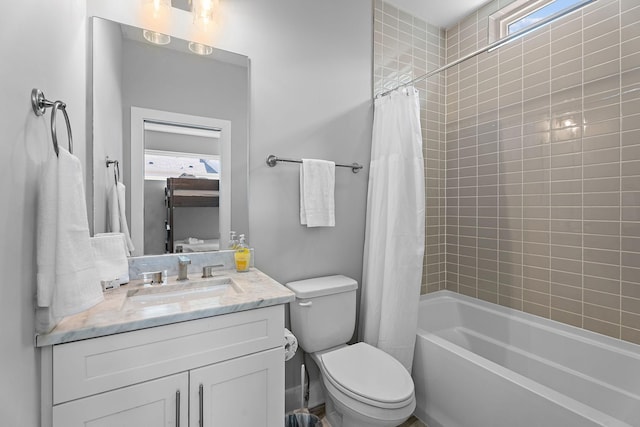 full bathroom with vanity, shower / bathtub combination with curtain, and toilet