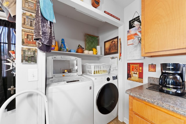 laundry room with independent washer and dryer