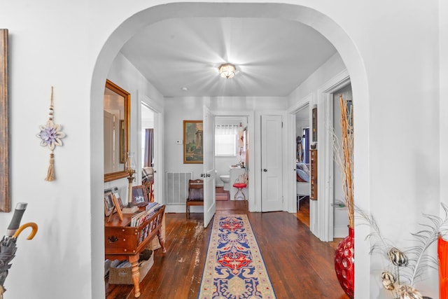 foyer entrance featuring dark hardwood / wood-style flooring