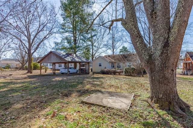 view of yard with a carport