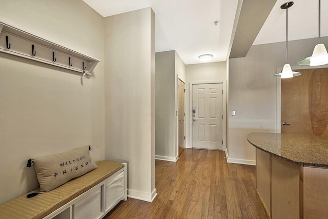 mudroom with light hardwood / wood-style flooring