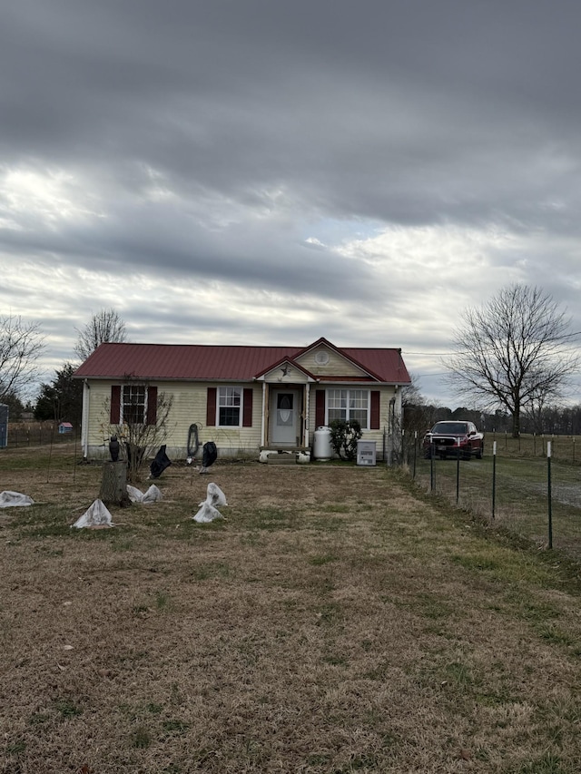 view of front of house with a front lawn