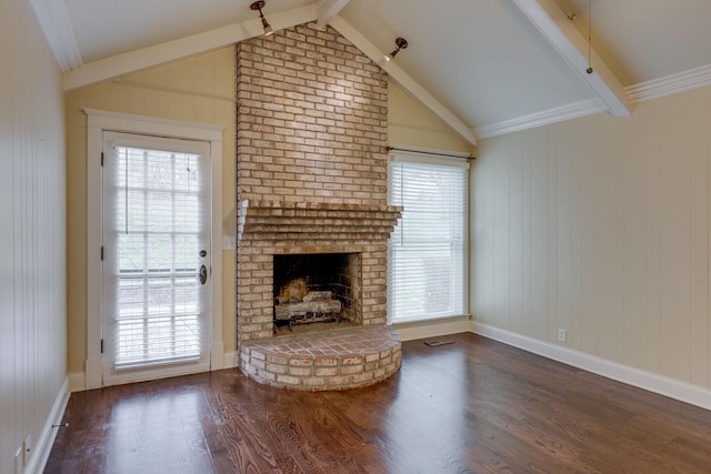 unfurnished living room featuring a brick fireplace, dark wood-type flooring, and vaulted ceiling with beams