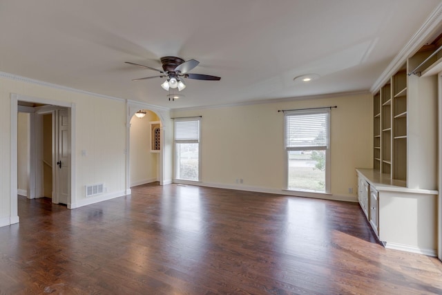 unfurnished living room with ornamental molding, dark hardwood / wood-style floors, and ceiling fan