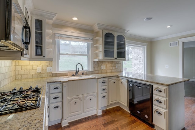 kitchen with dishwasher, sink, white cabinets, ornamental molding, and gas stovetop