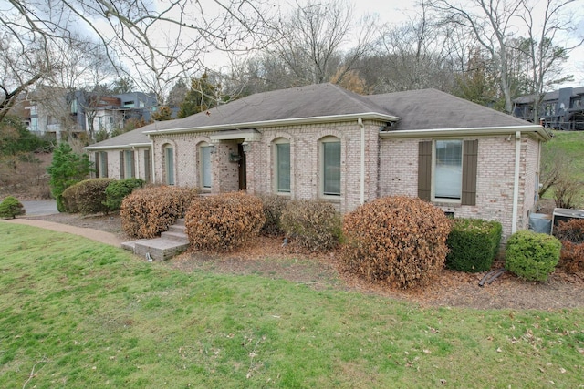 view of front of home with a front yard