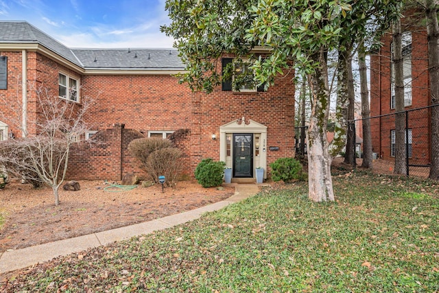 view of front of home with a front yard