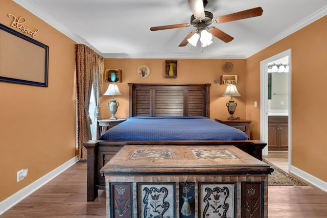 bedroom featuring ornamental molding, light hardwood / wood-style floors, ceiling fan, and ensuite bathroom