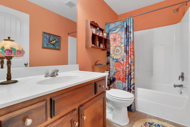 full bathroom with tile patterned flooring, vanity, toilet, and shower / bath combo