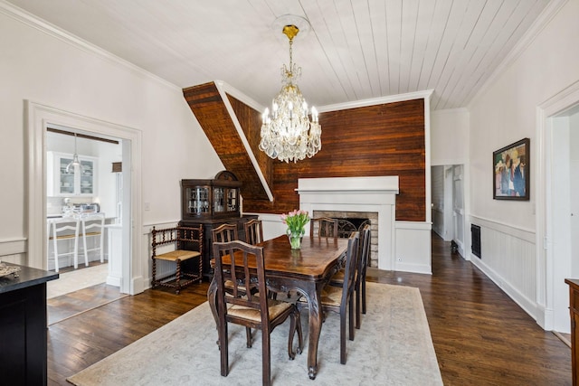 2111 Hoovers Rd, Duck River, TN 38454 - dining room featuring dark wood-type flooring, crown molding, a chandelier, and wooden ceiling