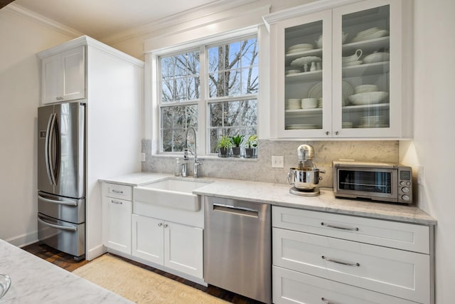 2111 Hoovers Rd, Duck River, TN 38454 - kitchen with sink, light stone counters, tasteful backsplash, stainless steel appliances, and white cabinets