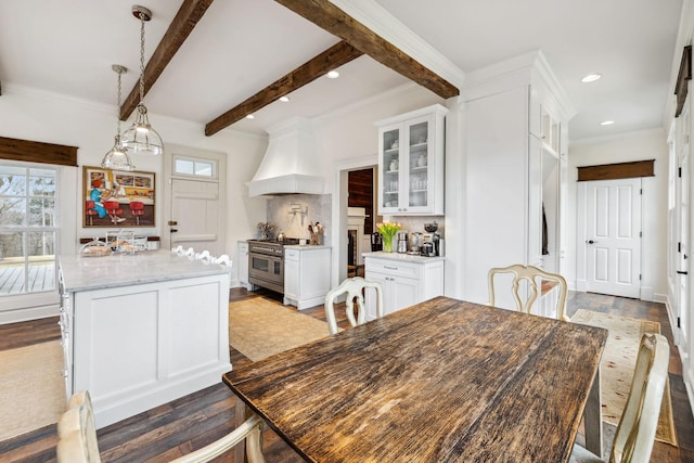 2111 Hoovers Rd, Duck River, TN 38454 - dining space featuring dark hardwood / wood-style flooring, beam ceiling, and crown molding