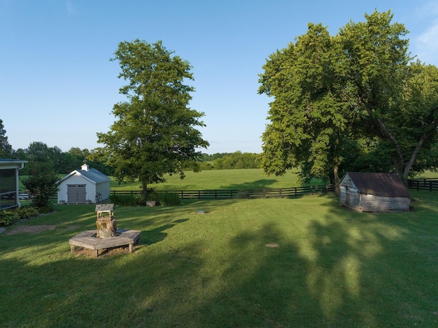 2111 Hoovers Rd, Duck River, TN 38454 - view of yard with a storage shed and a rural view