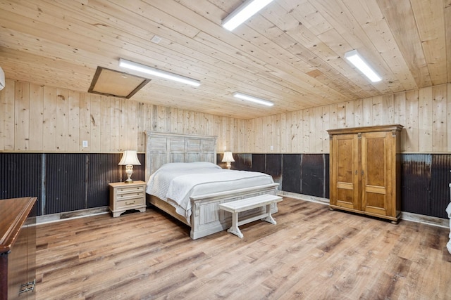 2111 Hoovers Rd, Duck River, TN 38454 - bedroom with wooden walls, wooden ceiling, and light hardwood / wood-style floors
