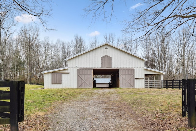 2111 Hoovers Rd, Duck River, TN 38454 - exterior space with an outdoor structure and a lawn