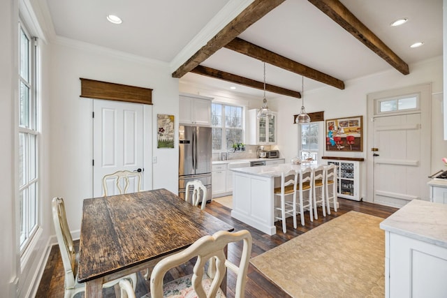 2111 Hoovers Rd, Duck River, TN 38454 - dining area with sink, beam ceiling, wine cooler, ornamental molding, and dark hardwood / wood-style flooring