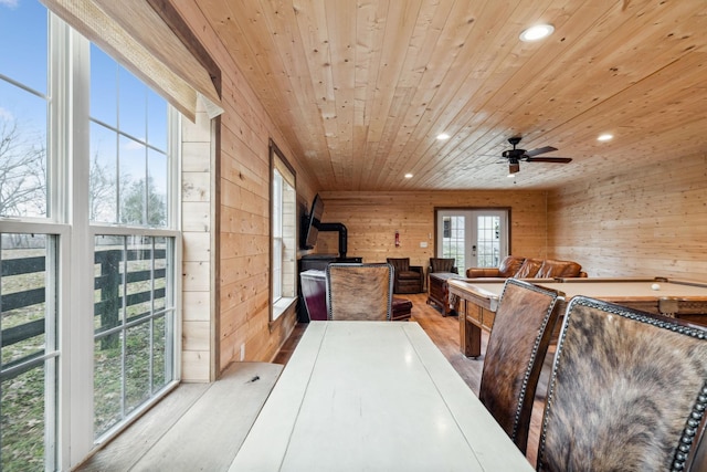 2111 Hoovers Rd, Duck River, TN 38454 - unfurnished dining area with ceiling fan, wooden ceiling, wooden walls, and french doors