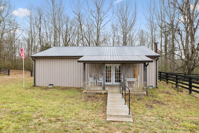 2111 Hoovers Rd, Duck River, TN 38454 - view of outbuilding featuring a yard and french doors