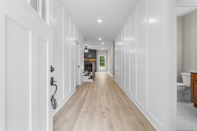 corridor featuring light wood-type flooring