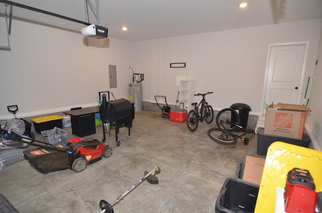 garage with a garage door opener and electric panel