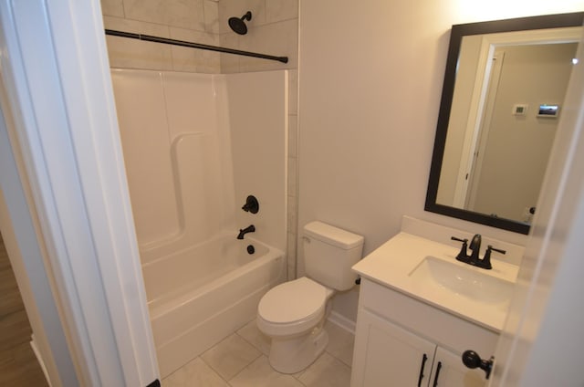 full bathroom featuring tile patterned flooring, vanity, toilet, and shower / bath combination