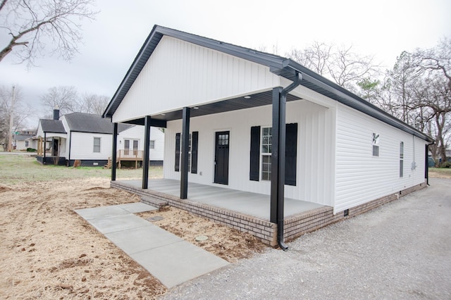 view of home's exterior with covered porch