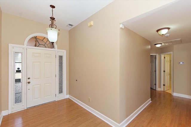 entrance foyer with wood-type flooring