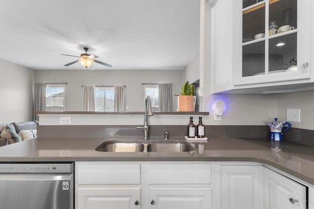 kitchen featuring white cabinetry, sink, plenty of natural light, and dishwasher