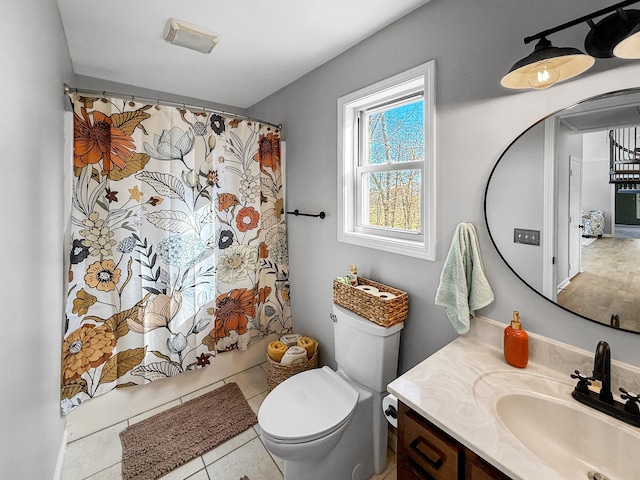 bathroom featuring visible vents, toilet, a shower with curtain, tile patterned floors, and vanity