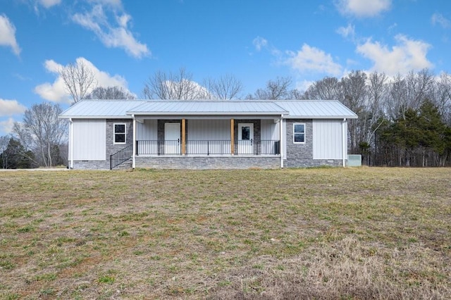 single story home with covered porch and a front lawn