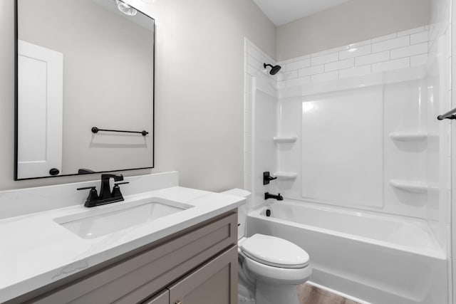 full bathroom with vanity, bathing tub / shower combination, and toilet