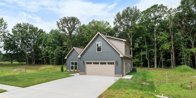 exterior space featuring a garage and a front lawn